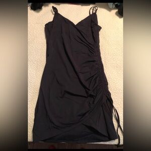 NWOT Garage Mini black dress with side slit - Size Medium